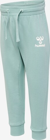 Effilé Pantalon de sport Hummel en vert