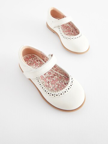 Next - Bailarina en blanco