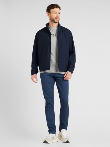 TOMMY HILFIGER Tussenjas in Blauw