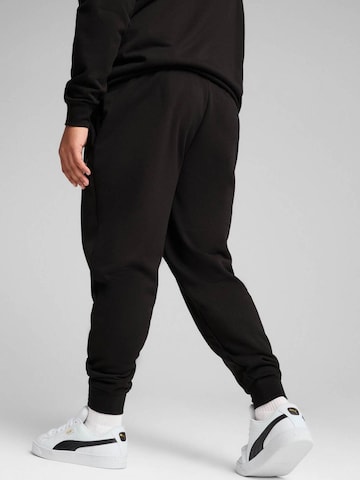regular Pantaloni sportivi 'Puma Ess No. 1 Logo Sweatpants Fl Cl' di PUMA in nero