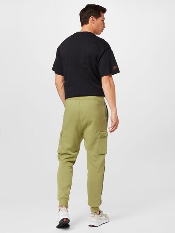 Nike Sportswear Alt kitsenev Klapptaskutega püksid, värv roheline