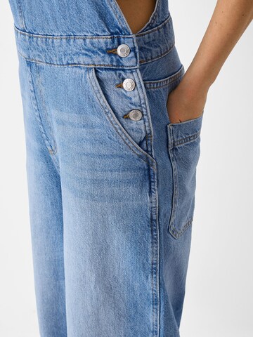 regular Jeans con pettorina di Bershka in blu