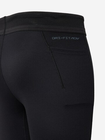 NIKE Skinny Workout Pants in Black