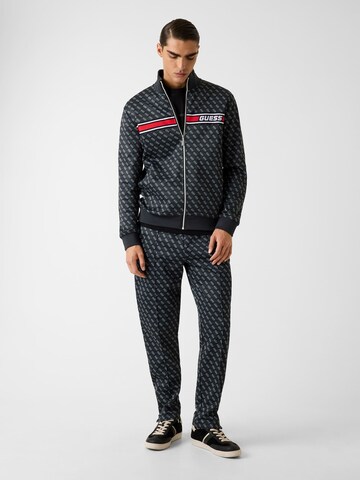 Giacca di felpa sportiva di GUESS in nero