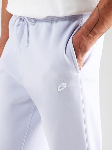 Nike Sportswear Tapered Housut 'CLUB' värissä sininen