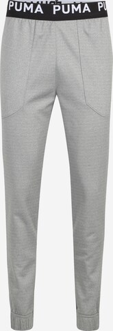 Tapered Pantaloni sportivi di PUMA in grigio: frontale