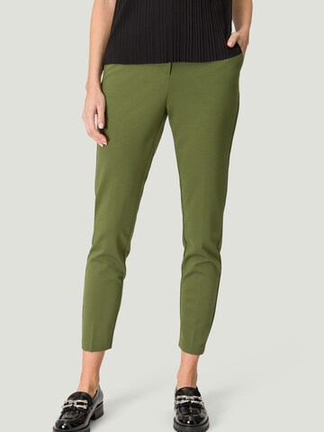 Slimfit Pantaloni con piega frontale di zero in verde: frontale
