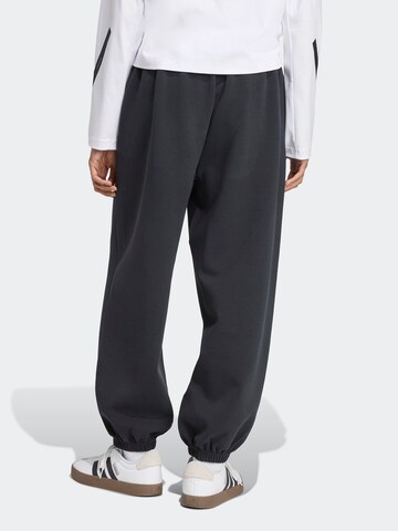 Loosefit Pantaloni sportivi 'Soft Luxe' di ADIDAS SPORTSWEAR in nero