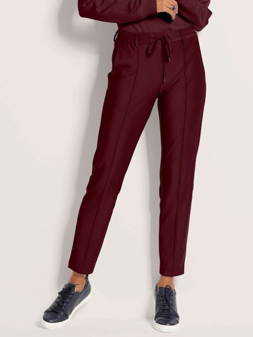 MADELEINE Slim fit Trousers in Red
