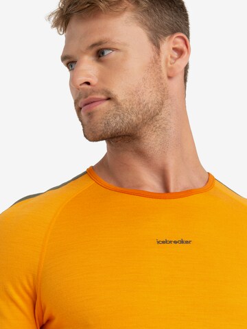 ICEBREAKER T-shirt i orange