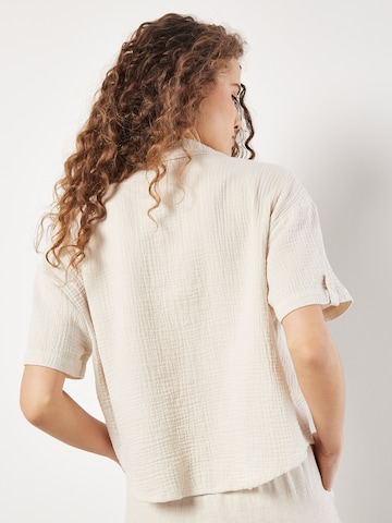 Chemisier Apricot en gris
