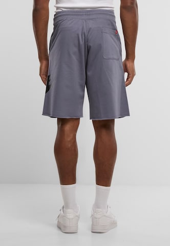Loosefit Pantaloni di Nike Sportswear in grigio