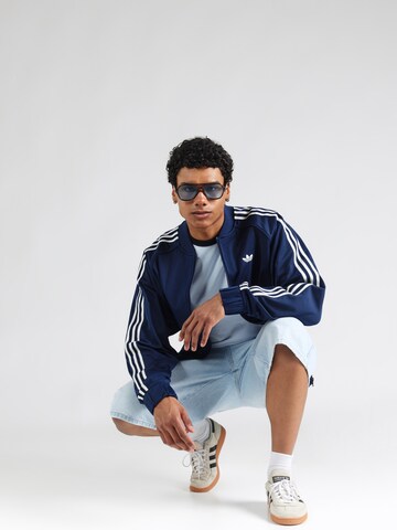 zils ADIDAS ORIGINALS Starpsezonu jaka 'BRITCORE'