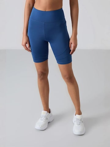 Tommy Life - Tapered Leggings 'Gamaschen' em azul