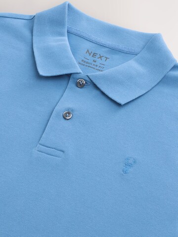 Next - Camiseta en azul