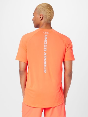 Maglia funzionale di UNDER ARMOUR in arancione