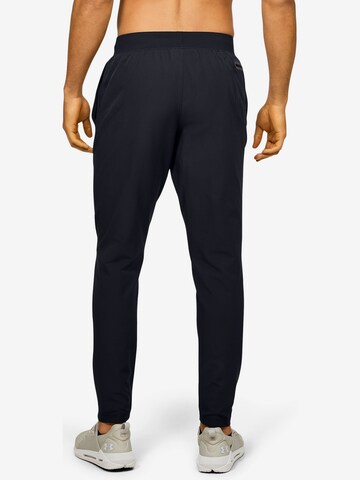 UNDER ARMOUR Tapered Sportbroek 'Unstoppable' in Zwart