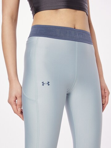 Skinny Pantaloni sportivi di UNDER ARMOUR in grigio