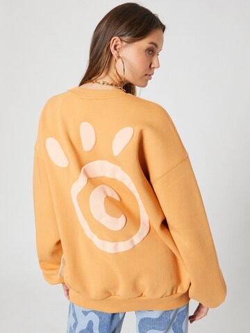 Smiles Sweatshirt 'Milo' i orange