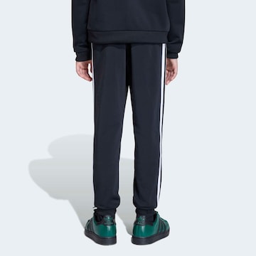 ADIDAS ORIGINALS Tapered Housut 'Sst' värissä musta