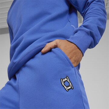 Regular Pantalon de sport 'Pivot EMB' PUMA en bleu