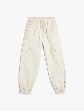 Koton Tapered Jeans in Beige: front