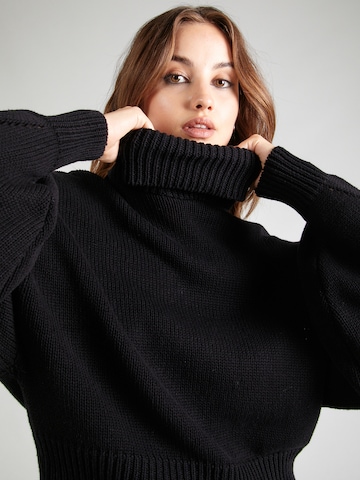 Pullover 'Jolin' di ABOUT YOU x Emili Sindlev in nero