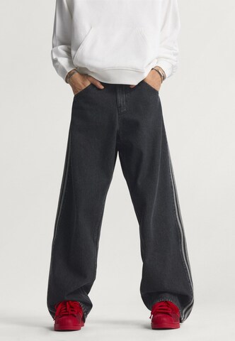 Loosefit Jean 'Firebird Adicolor' ADIDAS ORIGINALS en noir : devant