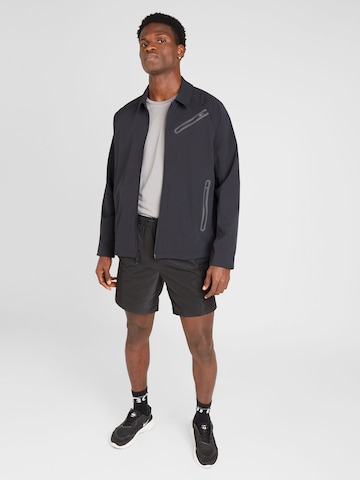 UNDER ARMOUR Spordijope 'Unstoppable Vent', värv must