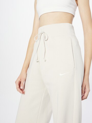 NIKE Wide leg Byxa 'Phoenix Fleece' i beige