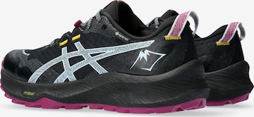 Scarpa da corsa di ASICS in nero