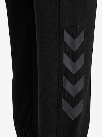 Regular Pantalon de sport 'TRAVEL' Hummel en noir