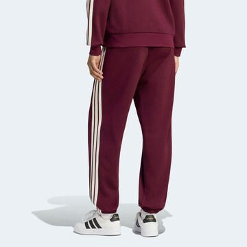 ADIDAS SPORTSWEAR Ozke Športne hlače 'Essentials' | rdeča barva