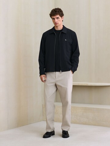 Next - Chaqueta de entretiempo 'Motionflex' en negro
