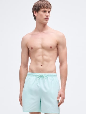 Calvin Klein Swimwear Hlače za k noši | zelena barva
