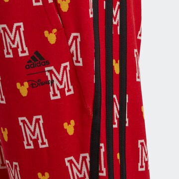 ADIDAS SPORTSWEAR Slimfit Sportovní kalhoty 'Disney Mickey Mouse' – červená