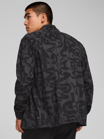 PUMA Sportjacke 'ENERGY' in Schwarz: Rückseite