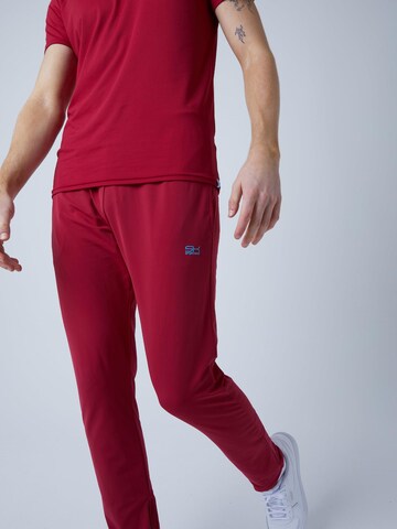 SPORTKIND Slimfit Sporthose 'Trainingshose schmal'‌‌‌‌‌‌‌‌ in Rot: Vorderseite