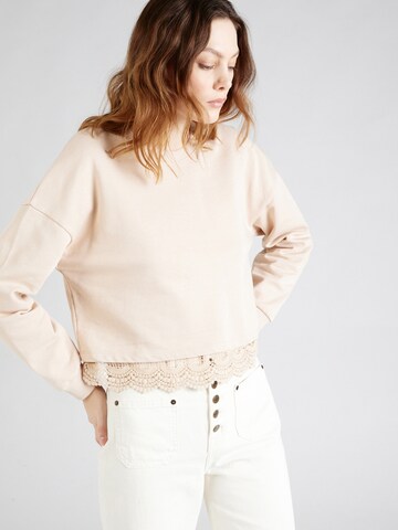 Sweat-shirt 'Georgeia' ABOUT YOU en beige : devant