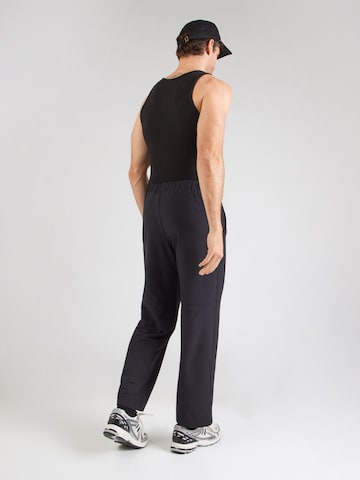 Reebok Normalny krój Spodnie sportowe 'REECE' w kolorze czarny