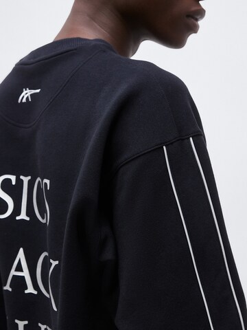 ASICS Športna majica 'TRACK CLUB HERITAGE' | črna barva