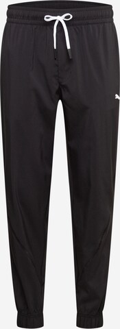 PUMA Tapered Workout Pants 'Train Vent' in Black: front