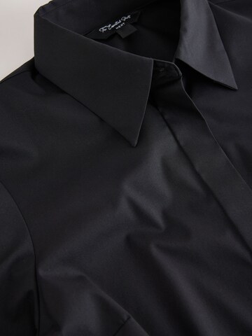 Next - Blusa 'Essential' en negro