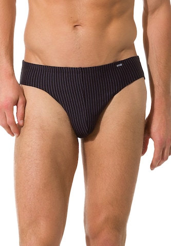 Skiny - Braga en negro: frente
