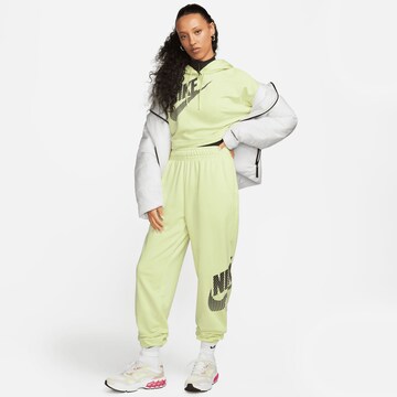 zaļš Nike Sportswear Pakapēniski sašaurināts piegriezums Bikses 'Emea'