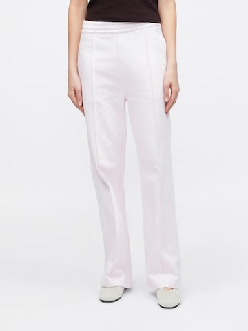 Calvin Klein Jeans Štandardný strih Nohavice - Ružová: predná strana