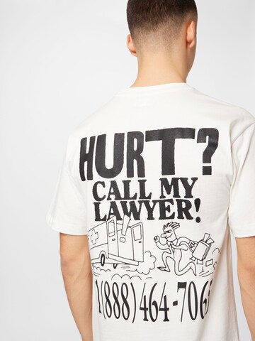 MARKET - Camiseta 'Call My Lawyer' en beige