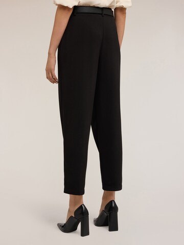 Loosefit Pantalon MOTIVI en noir