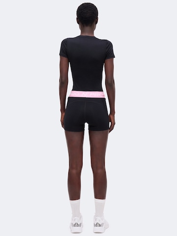 NIKESkinny Sportske hlače 'NP 365' - crna boja