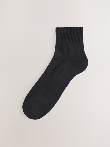 Next Sockor i grå